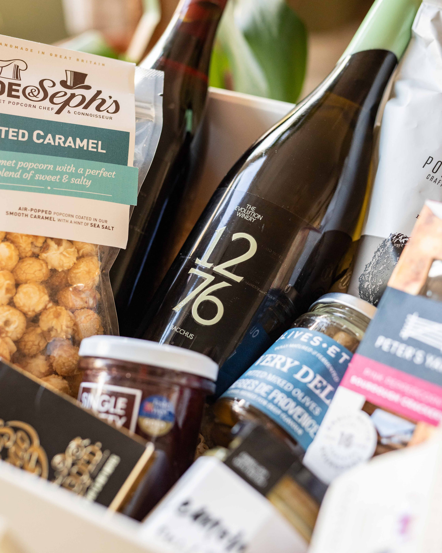 A close-up of the luxury food and drink inside a Lawrence & Co. hamper