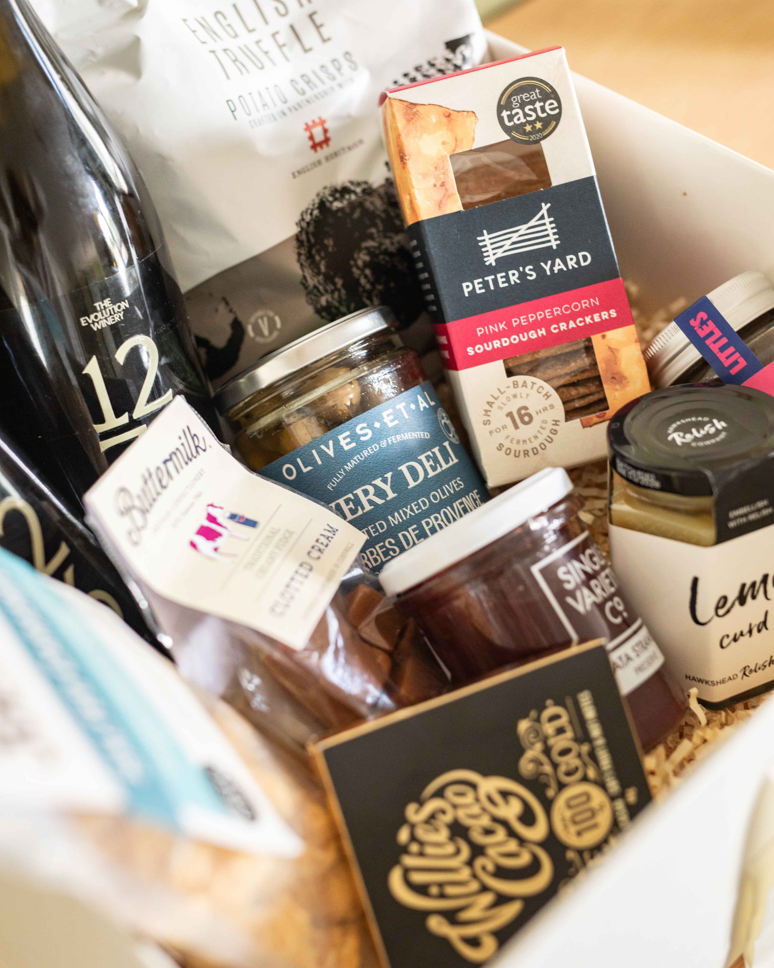British-made food and drink arranged inside a Lawrence & Co. hamper